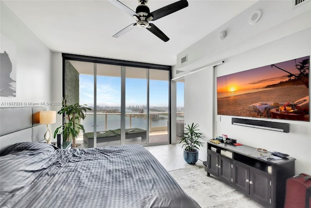 2020 N Bayshore Dr Unit 3408, Miami, FL 33137 - bedroom featuring floor to ceiling windows, access to exterior, multiple windows, light wood-type flooring, and ceiling fan