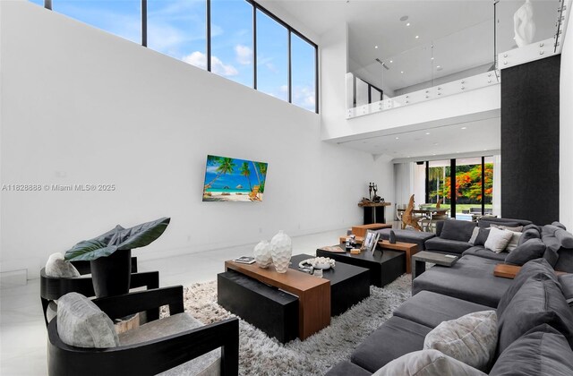 13441 Mustang Trl, Southwest Ranches, FL 33330 - living area featuring a towering ceiling