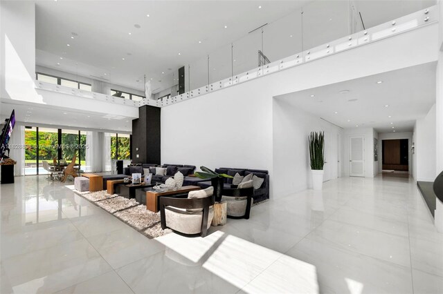 13441 Mustang Trl, Southwest Ranches, FL 33330 - building lobby featuring a high ceiling and recessed lighting