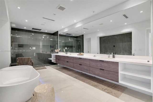 13441 Mustang Trl, Southwest Ranches, FL 33330 - bathroom featuring a soaking tub, a stall shower, double vanity, and marble tiled flooring