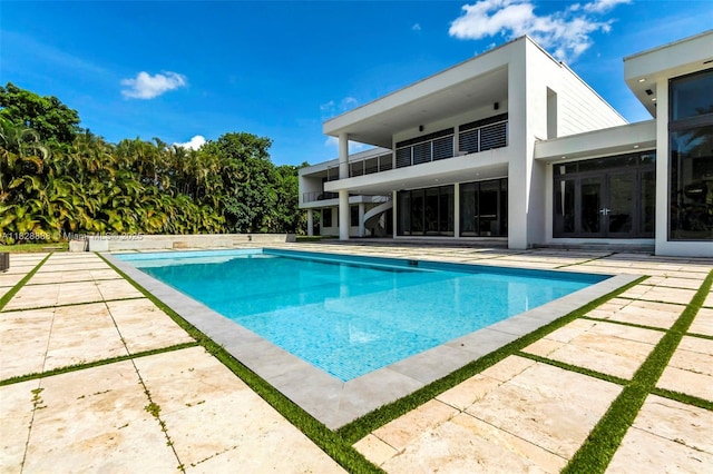 13441 Mustang Trl, Southwest Ranches, FL 33330 - swimming pool featuring a patio