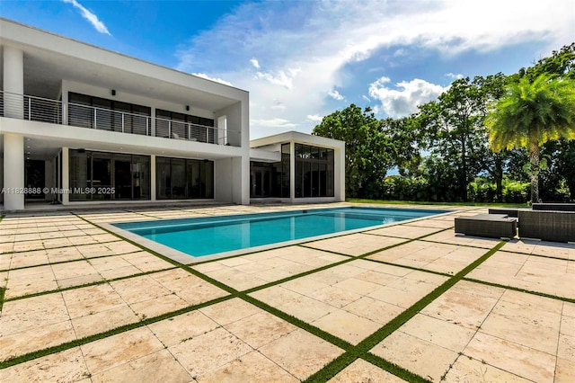 13441 Mustang Trl, Southwest Ranches, FL 33330 - outdoor pool featuring a patio