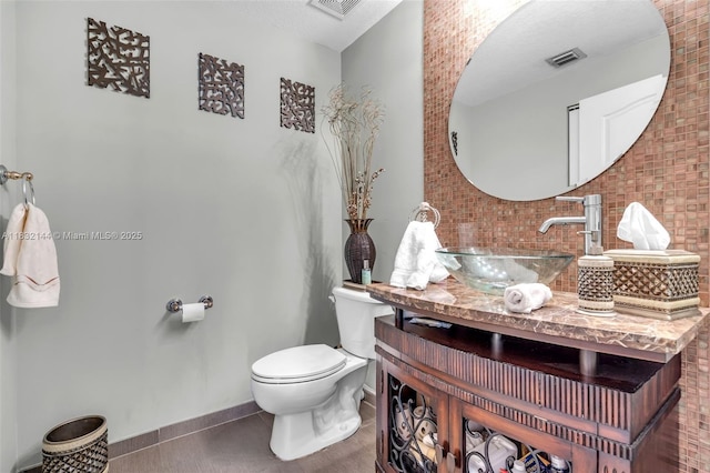 10700 NW 66th St Unit 308, Doral, FL 33178 - bathroom featuring decorative backsplash and vanity