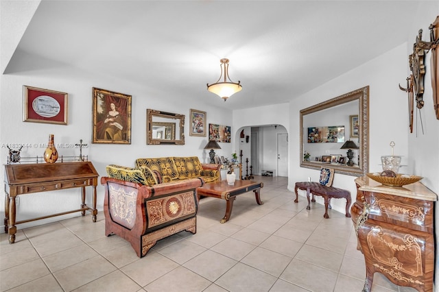 10700 NW 66th St Unit 308, Doral, FL 33178 - living area featuring arched walkways and light tile patterned floors