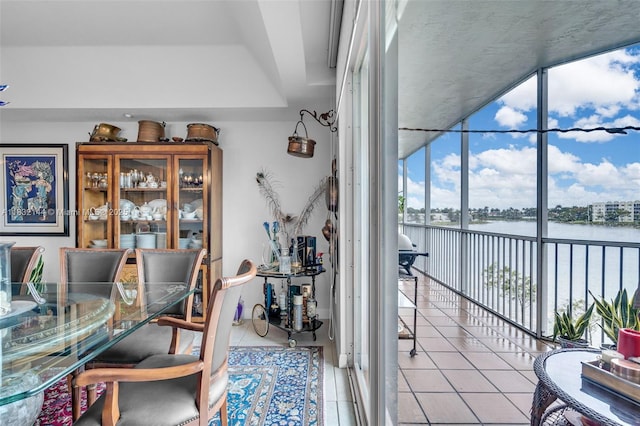 10700 NW 66th St Unit 308, Doral, FL 33178 - tiled office with floor to ceiling windows and a water view
