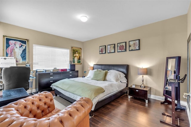 10700 NW 66th St Unit 308, Doral, FL 33178 - bedroom featuring wood finished floors and baseboards