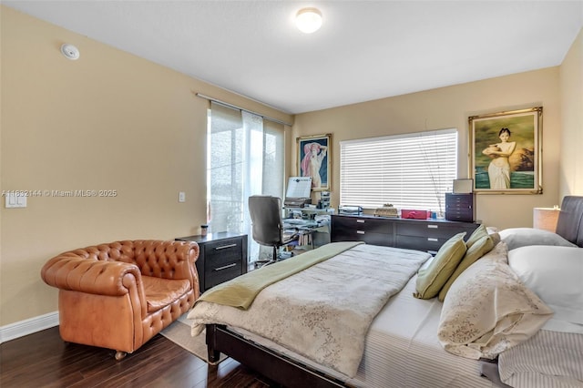 10700 NW 66th St Unit 308, Doral, FL 33178 - bedroom featuring wood finished floors and an office area