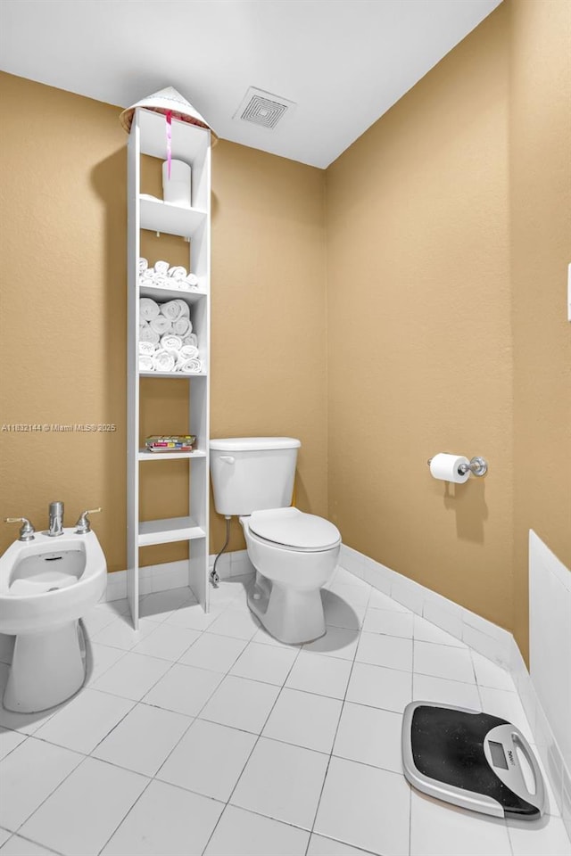 10700 NW 66th St Unit 308, Doral, FL 33178 - half bath featuring a bidet and tile patterned flooring