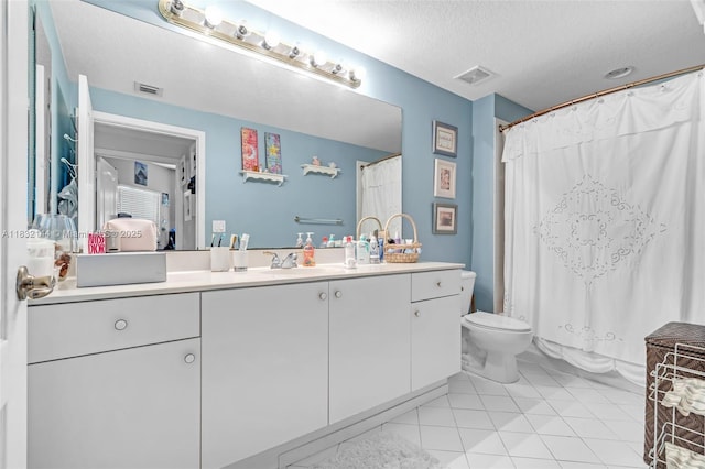 10700 NW 66th St Unit 308, Doral, FL 33178 - bathroom with vanity, tile patterned floors, a textured ceiling, and a shower with curtain
