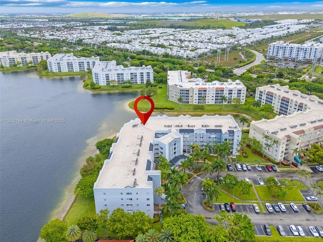 10700 NW 66th St Unit 308, Doral, FL 33178 - bird's eye view of a nearby body of water and apartment complex