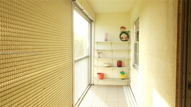 13250 SW 7th Ct Unit 313L, Pembroke Pines, FL 33027 - hallway with tile patterned floors