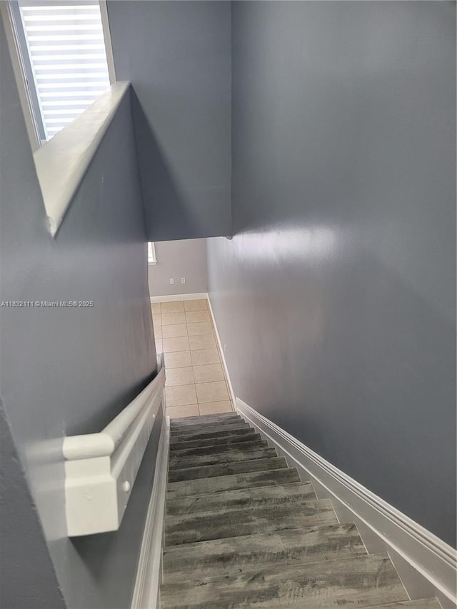 7145 NW 173rd Dr Unit 1108, Hialeah, FL 33015 - stairway featuring baseboards and tile patterned flooring