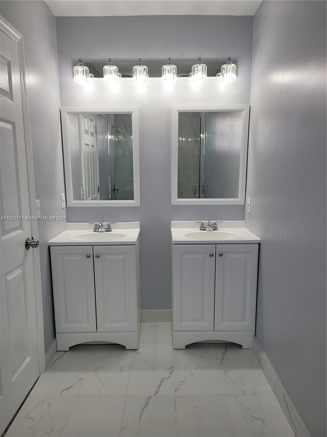 7145 NW 173rd Dr Unit 1108, Hialeah, FL 33015 - full bath featuring two vanities, marble finish floors, and a shower