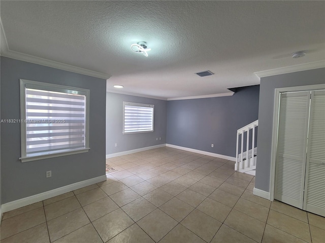 7145 NW 173rd Dr Unit 1108, Hialeah, FL 33015 - spare room featuring crown molding, a textured ceiling, light tile patterned floors, stairs, and a smoke detector