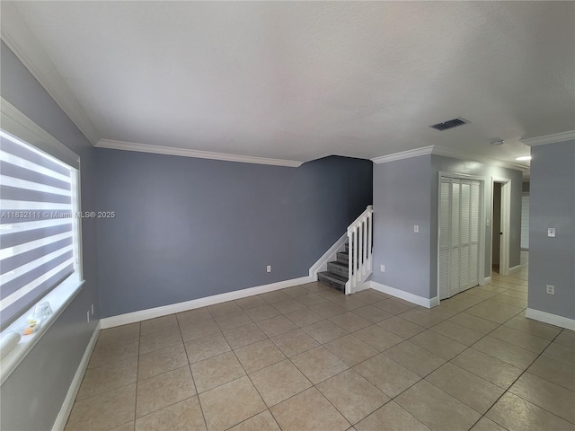 7145 NW 173rd Dr Unit 1108, Hialeah, FL 33015 - empty room with stairway, ornamental molding, and light tile patterned floors