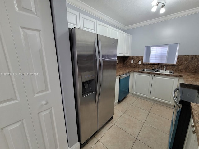 7145 NW 173rd Dr Unit 1108, Hialeah, FL 33015 - kitchen featuring stainless steel appliances, ornamental molding, white cabinets, light tile patterned floors, and dark countertops