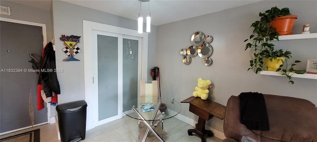 3522 NE 171st St Unit 104, North Miami Beach, FL 33160 - dining space with baseboards