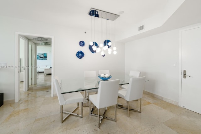 18911 Collins Ave Unit 2002, Sunny Isles Beach, FL 33160 - dining area featuring baseboards