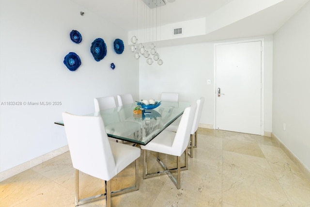 18911 Collins Ave Unit 2002, Sunny Isles Beach, FL 33160 - dining area with baseboards