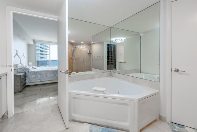 18911 Collins Ave Unit 2002, Sunny Isles Beach, FL 33160 - bathroom with ensuite bath, a bath, vanity, and tile patterned flooring