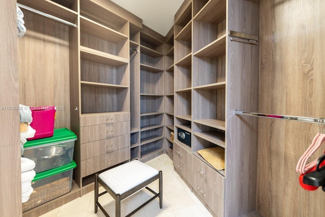 18911 Collins Ave Unit 2002, Sunny Isles Beach, FL 33160 - walk in closet featuring light tile patterned floors
