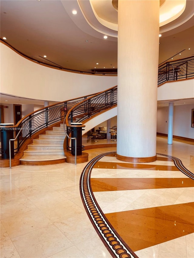18911 Collins Ave Unit 2002, Sunny Isles Beach, FL 33160 - common area featuring a high ceiling, stairs, and recessed lighting