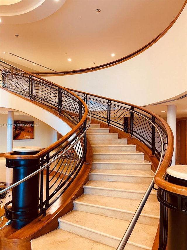 18911 Collins Ave Unit 2002, Sunny Isles Beach, FL 33160 - staircase featuring wood finished floors and recessed lighting