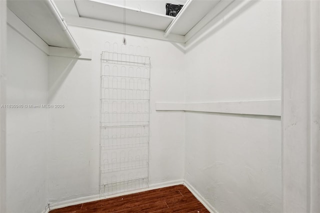 3842 SW 68th Ave, Miramar, FL 33023 - walk in closet featuring dark wood-type flooring