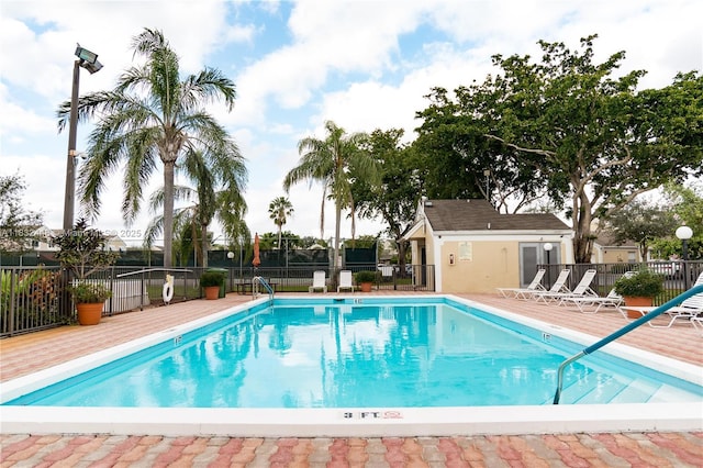 1239 NW 122nd Ter, Pembroke Pines, FL 33026 - community pool with a wooden deck