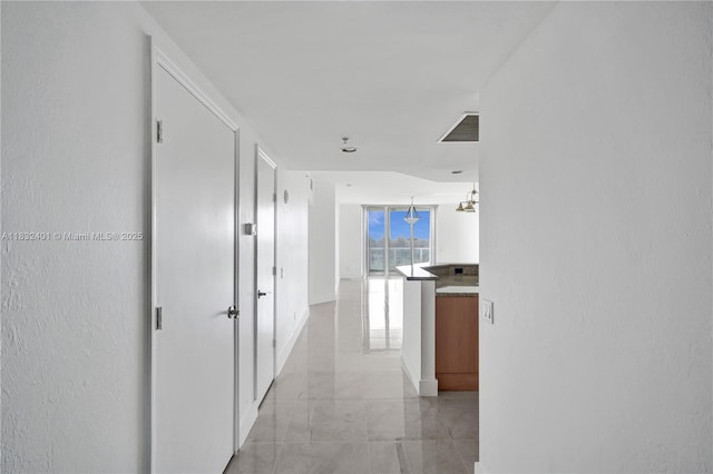 14951 Royal Oaks Ln Unit 806, North Miami, FL 33181 - corridor featuring light marble finish flooring