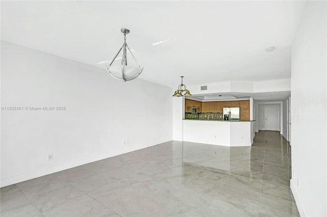 14951 Royal Oaks Ln Unit 806, North Miami, FL 33181 - unfurnished living room featuring baseboards and light marble finish floors