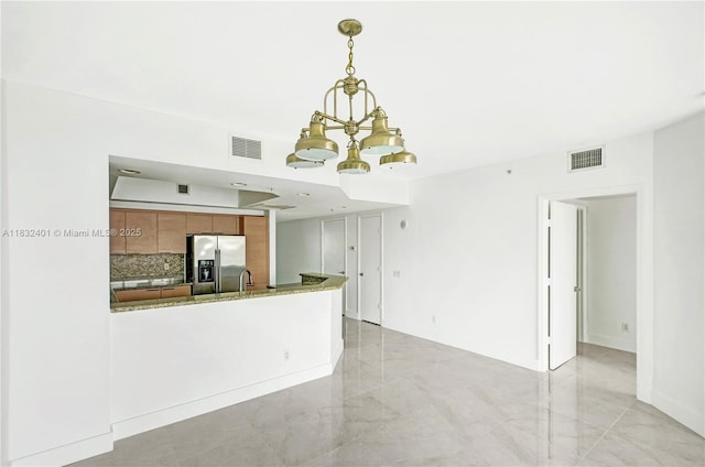14951 Royal Oaks Ln Unit 806, North Miami, FL 33181 - unfurnished living room featuring a chandelier and light marble finish flooring