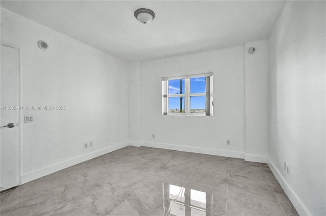 14951 Royal Oaks Ln Unit 806, North Miami, FL 33181 - unfurnished room featuring baseboards