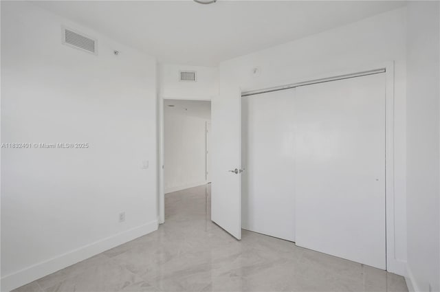 14951 Royal Oaks Ln Unit 806, North Miami, FL 33181 - unfurnished bedroom featuring a closet