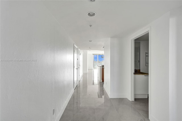 14951 Royal Oaks Ln Unit 806, North Miami, FL 33181 - hallway featuring baseboards