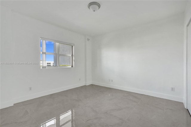 14951 Royal Oaks Ln Unit 806, North Miami, FL 33181 - empty room with baseboards