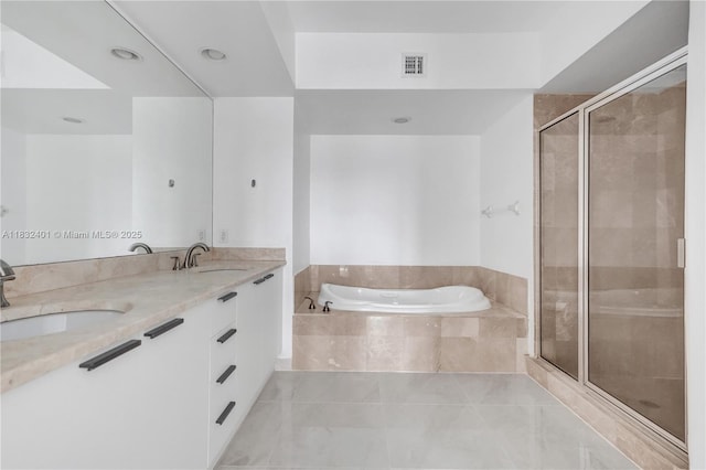 14951 Royal Oaks Ln Unit 806, North Miami, FL 33181 - bathroom featuring a bath, a stall shower, double vanity, and tile patterned flooring
