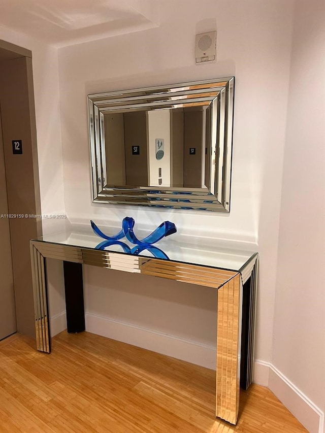 18201 Collins Ave Unit 1202, Sunny Isles Beach, FL 33160 - detailed view of wood finished floors and elevator
