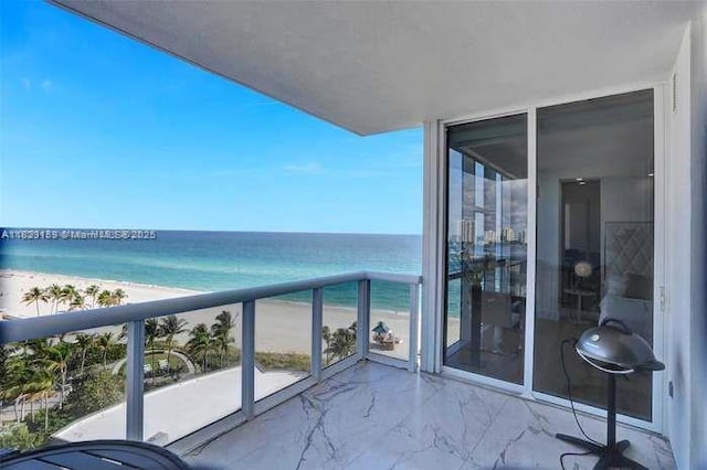 18201 Collins Ave Unit 1202, Sunny Isles Beach, FL 33160 - balcony featuring view of water and beach