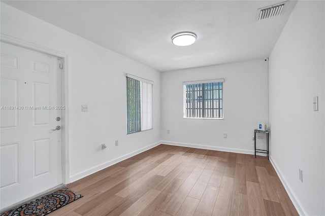 12254 SW 217th St, Miami, FL 33170 - spare room featuring wood finished floors and baseboards