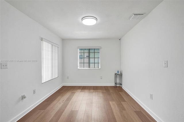 12254 SW 217th St, Miami, FL 33170 - unfurnished room featuring wood finished floors and baseboards