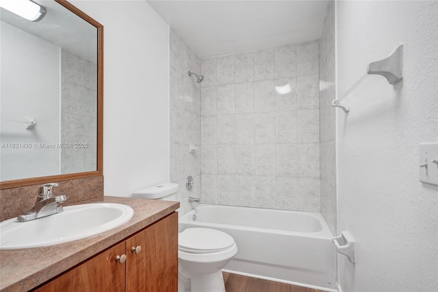 12254 SW 217th St, Miami, FL 33170 - bathroom featuring vanity, shower / tub combination, and wood finished floors