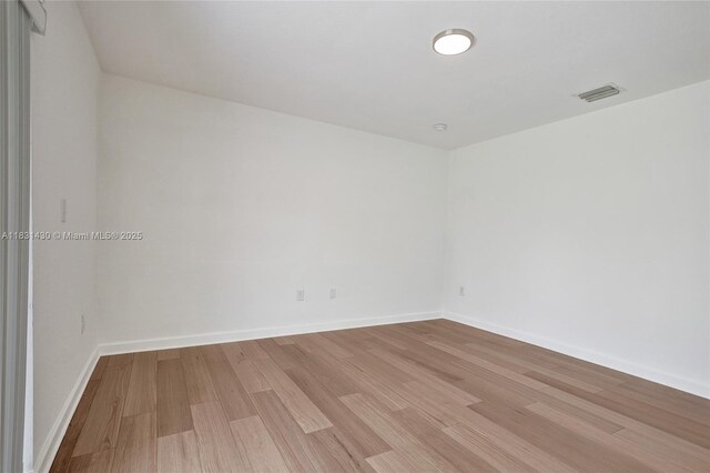 12254 SW 217th St, Miami, FL 33170 - unfurnished room with wood finished floors and baseboards