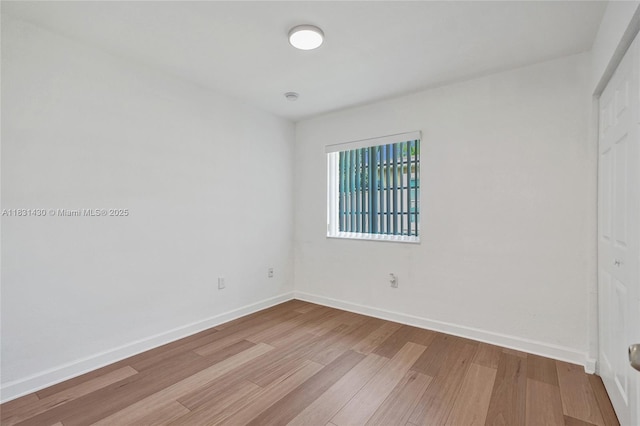 12254 SW 217th St, Miami, FL 33170 - unfurnished bedroom featuring light wood-style floors and baseboards