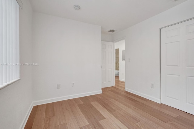 12254 SW 217th St, Miami, FL 33170 - unfurnished bedroom featuring light wood finished floors and a closet
