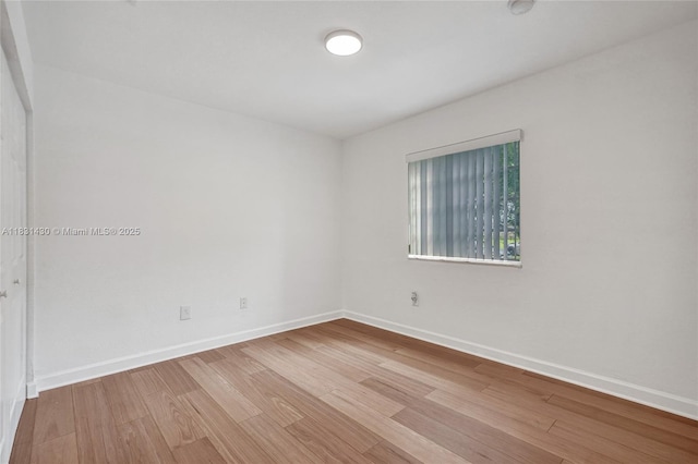 12254 SW 217th St, Miami, FL 33170 - spare room featuring wood finished floors