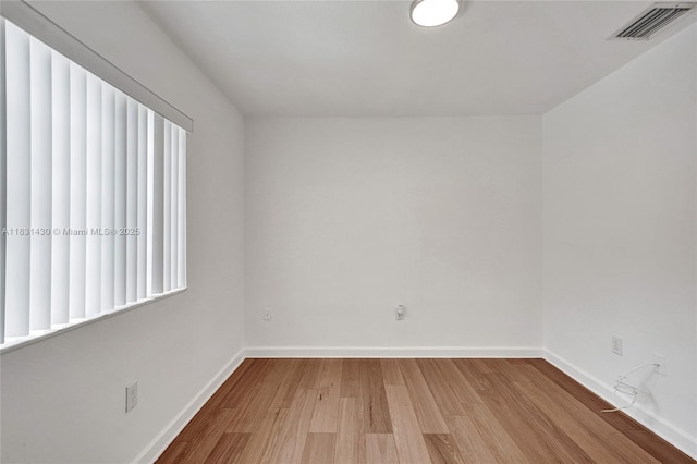 12254 SW 217th St, Miami, FL 33170 - unfurnished room featuring wood finished floors and baseboards