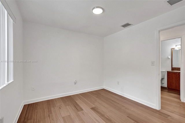 12254 SW 217th St, Miami, FL 33170 - spare room with light wood-style flooring and baseboards