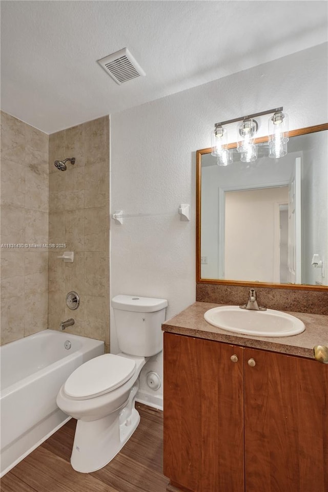 12254 SW 217th St, Miami, FL 33170 - full bathroom featuring vanity, wood finished floors, and shower / bath combination