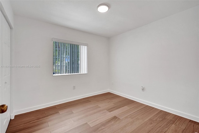 12254 SW 217th St, Miami, FL 33170 - empty room featuring light wood-style flooring and baseboards